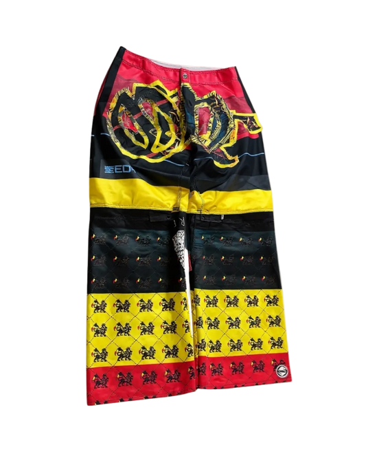 Calça baggie customizada OWLSHIT tactel  REGGAE