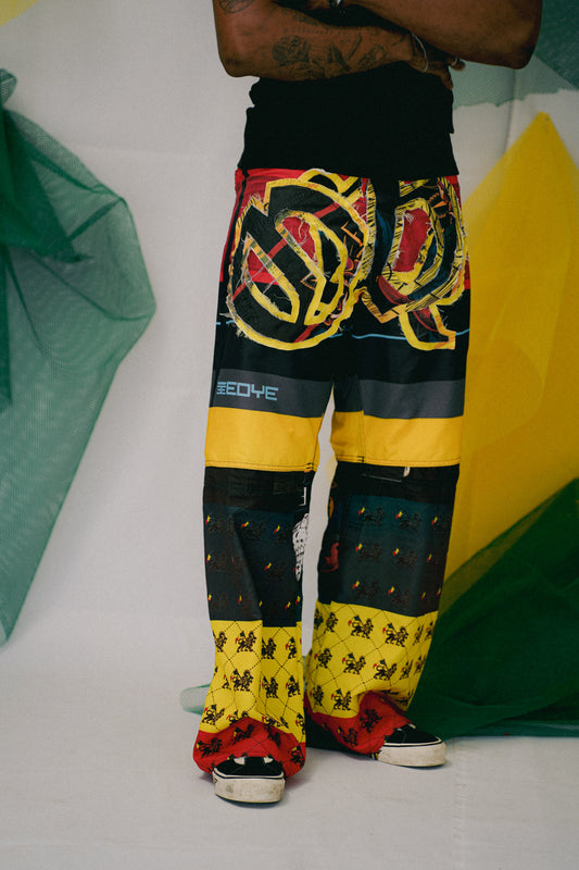 Calça baggie customizada OWLSHIT tactel  REGGAE